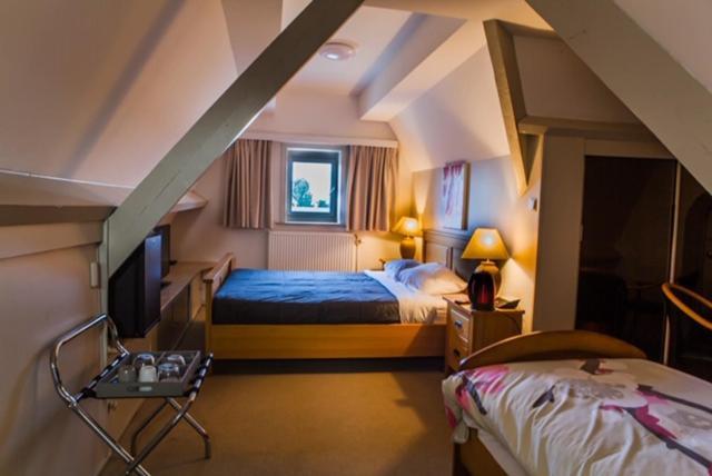 Hotel La Chaumiere Asse Bagian luar foto